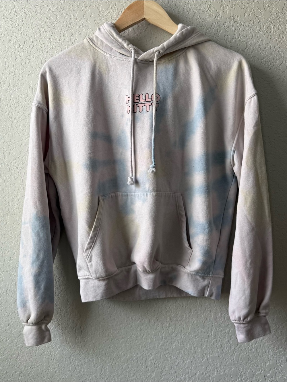Sanrio Hello Kitty Cream and Black Graphic Sweatshirt Label Detail